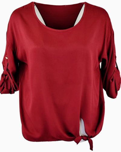Egyszínű, egyenes csípőre érő fazonú, hosszú ujjú, környakú, fiatalos olasz felsőrész, alul oldalt megköthető masnival- bordó